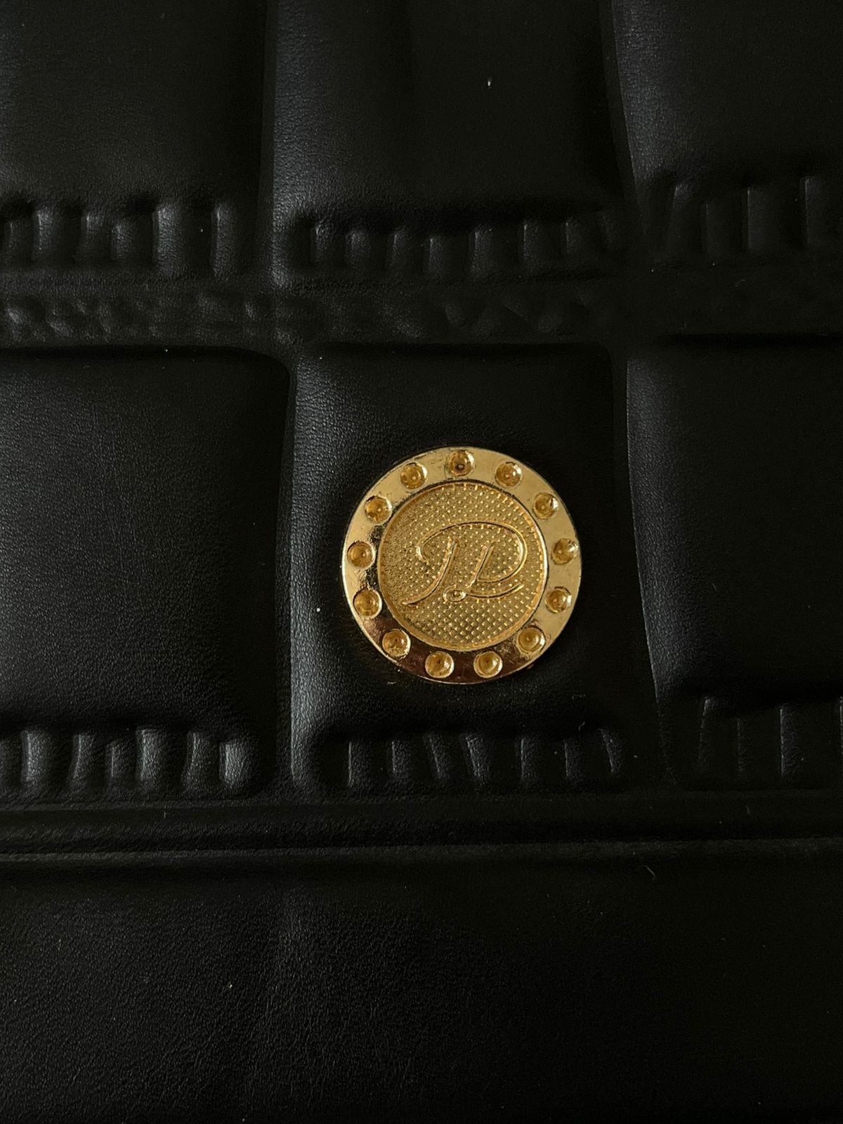 Black Shoulder Bag With a Hanging Accessorie
