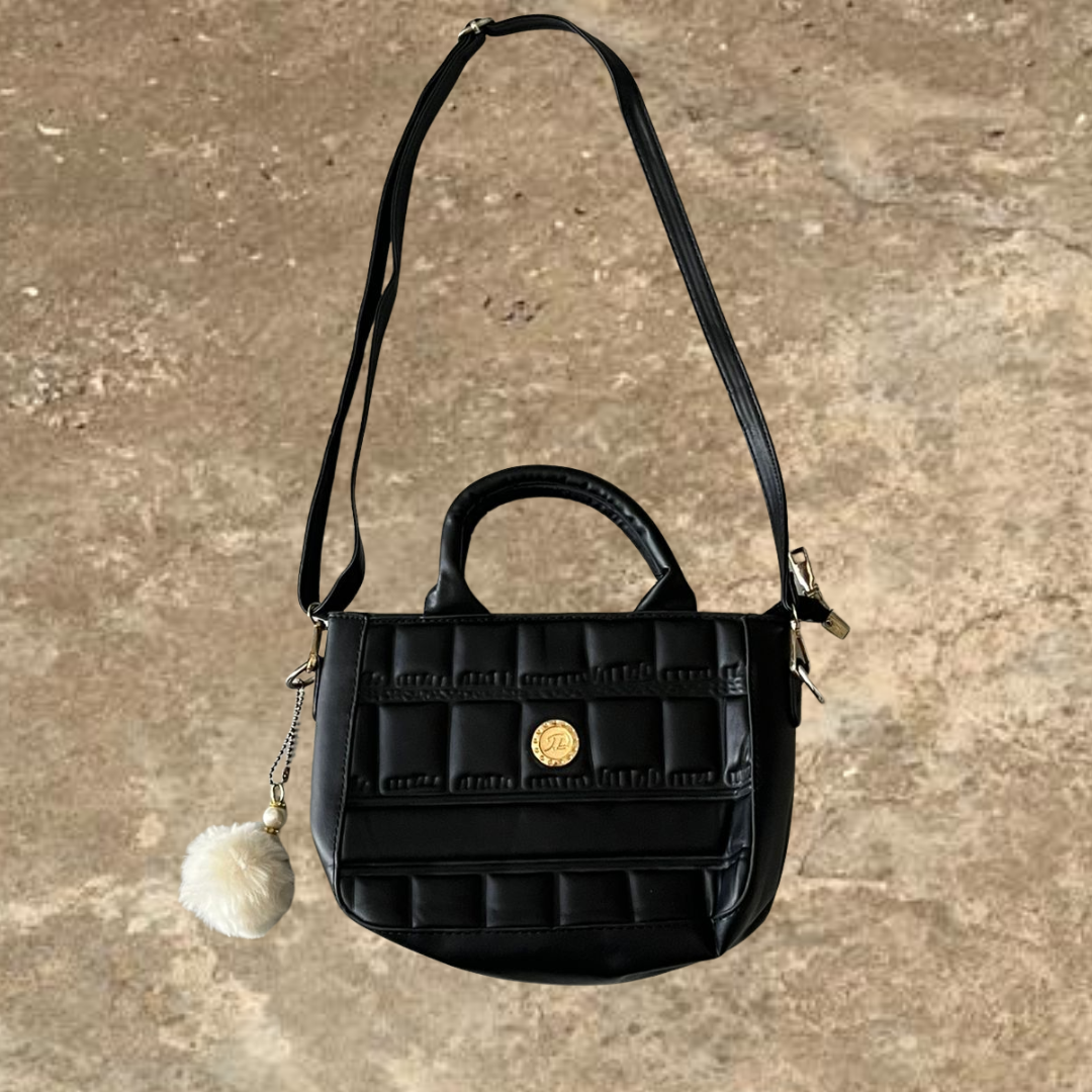 Black Shoulder Bag With a Hanging Accessorie